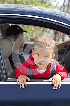 Baby and father in a car