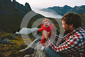 Baby with father traveling in mountains family healthy lifestyle outdoor