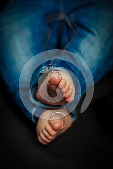 Baby feet. Happy Family concept. Beautiful conceptual image of Maternity