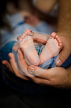 Baby feet. Happy Family concept. Beautiful conceptual image of Maternity