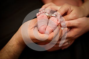 Baby feet. Happy Family concept. Beautiful conceptual image of Maternity