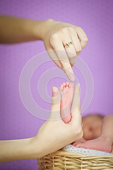 Baby feet. Happy Family concept. Beautiful conceptual image of Maternity