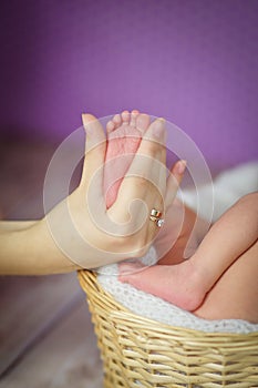 Baby feet. Happy Family concept. Beautiful conceptual image of Maternity