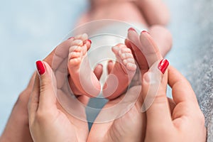 Baby feet in mother hands