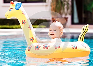 Baby with a float