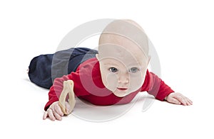 Baby on floor, isolated in white background