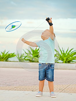 Baby with flying saucer