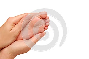 Baby foot in female hands