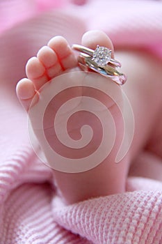 Baby foot and wedding rings