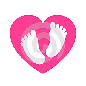 Baby footprints in heart icon - photo