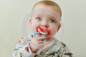 Baby with funny dummy