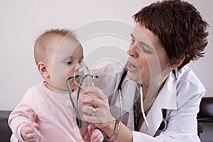 Baby getting nebulizer treatment