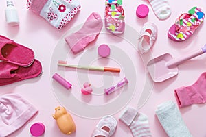 Baby girl accesories on pink background  baby shower concept