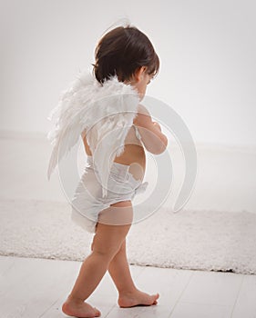 Baby girl with angel wings