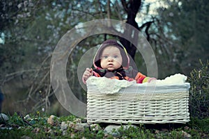 Baby girl in a basket