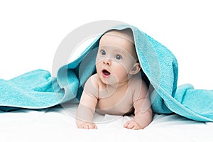 Baby girl or boy after shower with towel on head, isolated on white