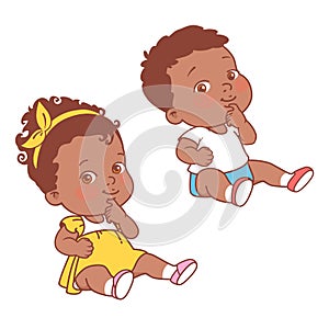 Baby girl and boy sitting on white background.