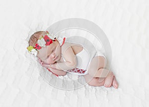 Baby girl in bright colorful hairband photo