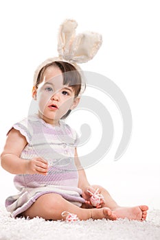 Baby girl with bunny ears
