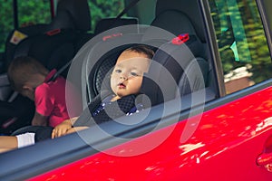 Baby girl in a car seat