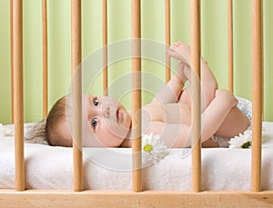 Baby girl in a crib