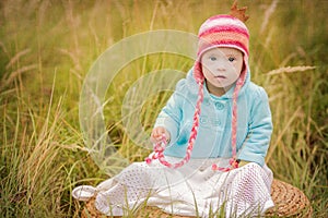 Baby girl with Down syndrome looks surprised