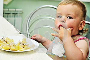 Baby girl eating