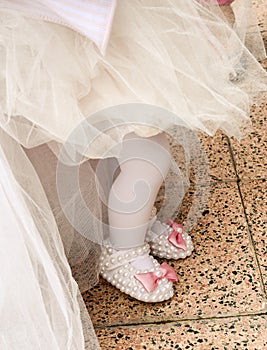 Baby girl footwear at first birthday party