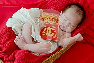baby girl with gesture of happy chinese new year