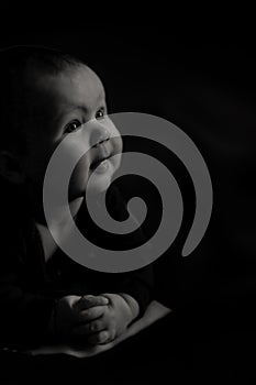 Baby Girl With Hands Folded for Peaceful Prayer