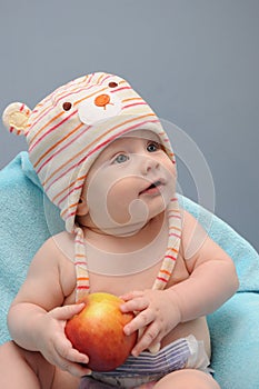 Baby girl hold the apple