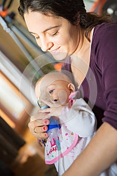 Baby girl with inhalator
