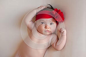 Baby Girl with a Large, Red, Flower Headband