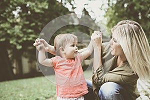 Baby girl learning walking.