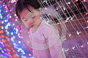 Baby girl with led lights background
