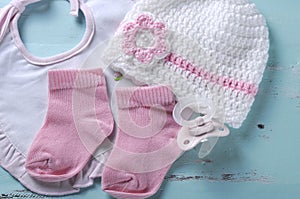 Baby girl nursery dummy pacifier, socks, bib and bonnet