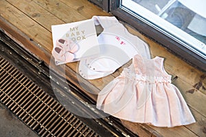 Baby girl pink dress clothes with newborn book album