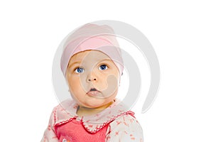 Baby girl in a pink dress and hat. Portrait. Studio. Isolated.