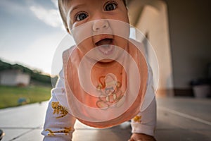 Baby Girl Playing in the Grass Field Smiling