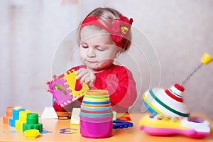 Baby girl playing sorter