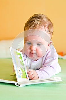 Baby girl reading