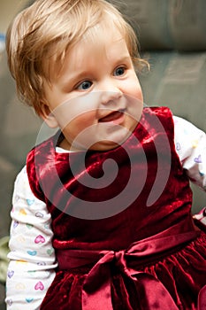 Baby girl in red dress