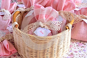 Baby girl shower favours pink jute gift bags with cotton lace and custom label