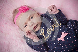 Baby Girl Sleeping in Blue Dress