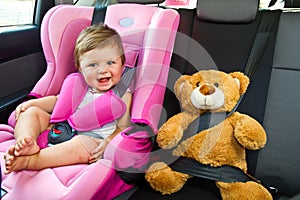 Baby girl smile in car