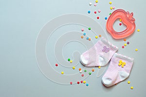 Baby girl socks and teether toy