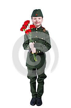 Baby girl standing in uniform with red flowers, on white background