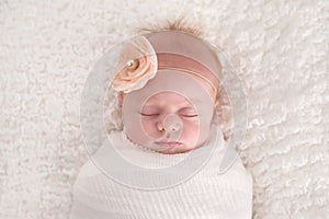 Baby Girl Swaddled in White