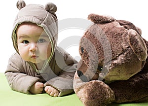 Baby girl with toy bear isolated