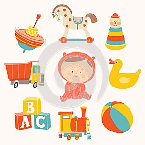 Baby girl with toys : ball, blocks, rubber duck, rocking horse, toy train, pyramid, spinning top, toy truck.